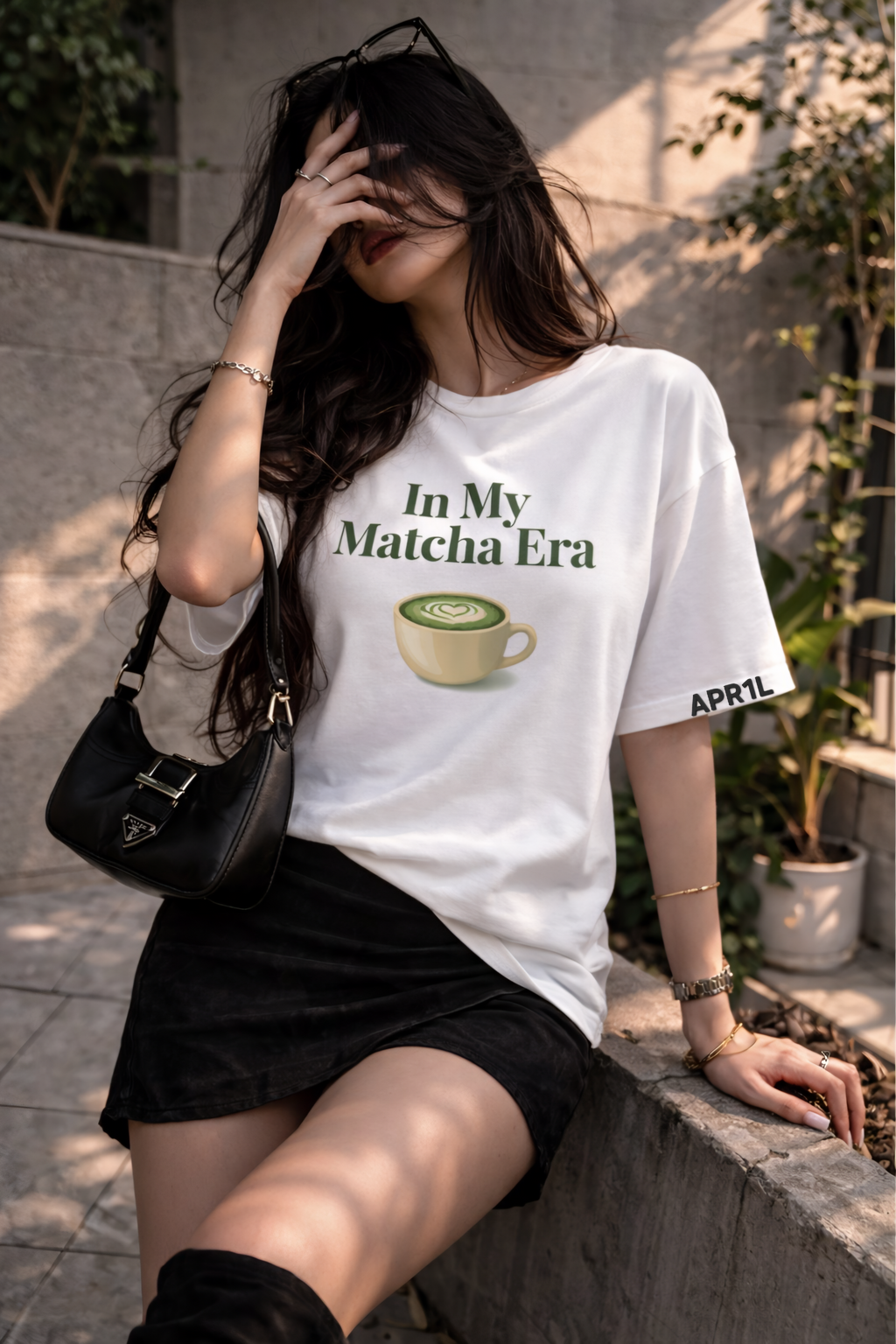 Model wearing APR1L Ritual cream white aesthetic oversized t-shirt in my matcha era.